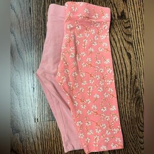 Two pairs of 3/4 length bottoms. Print and pink 3yrs old